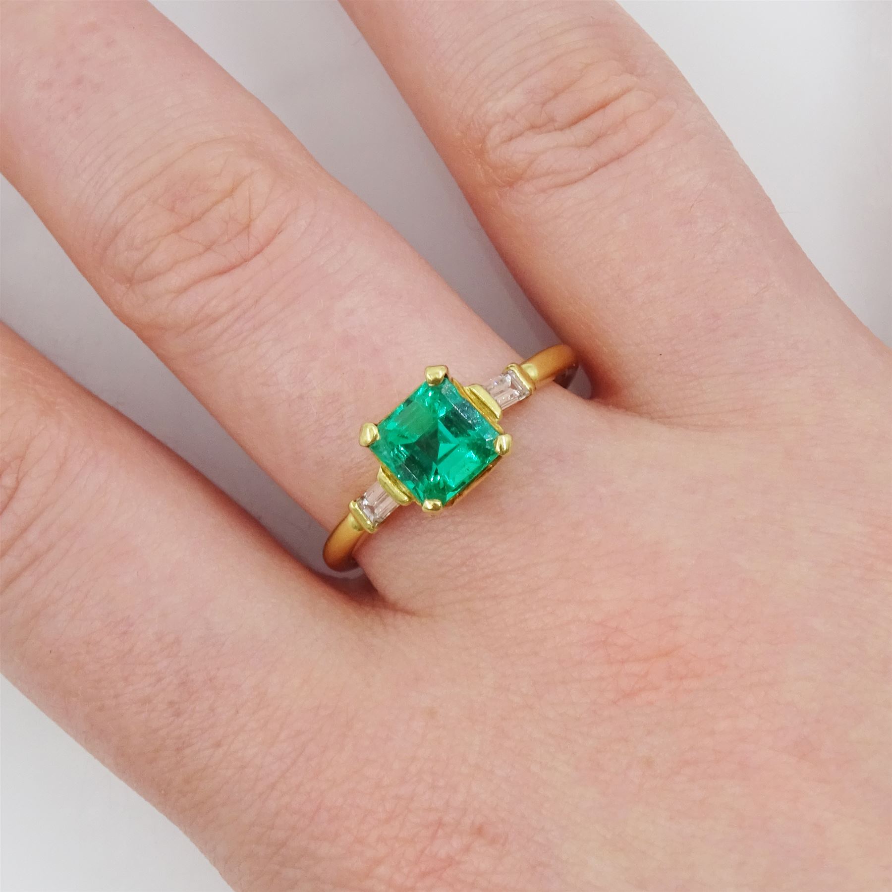 18ct gold three stone square cut emerald and baguette cut diamond ring, hallmarked, emerald approx 1.35 carat