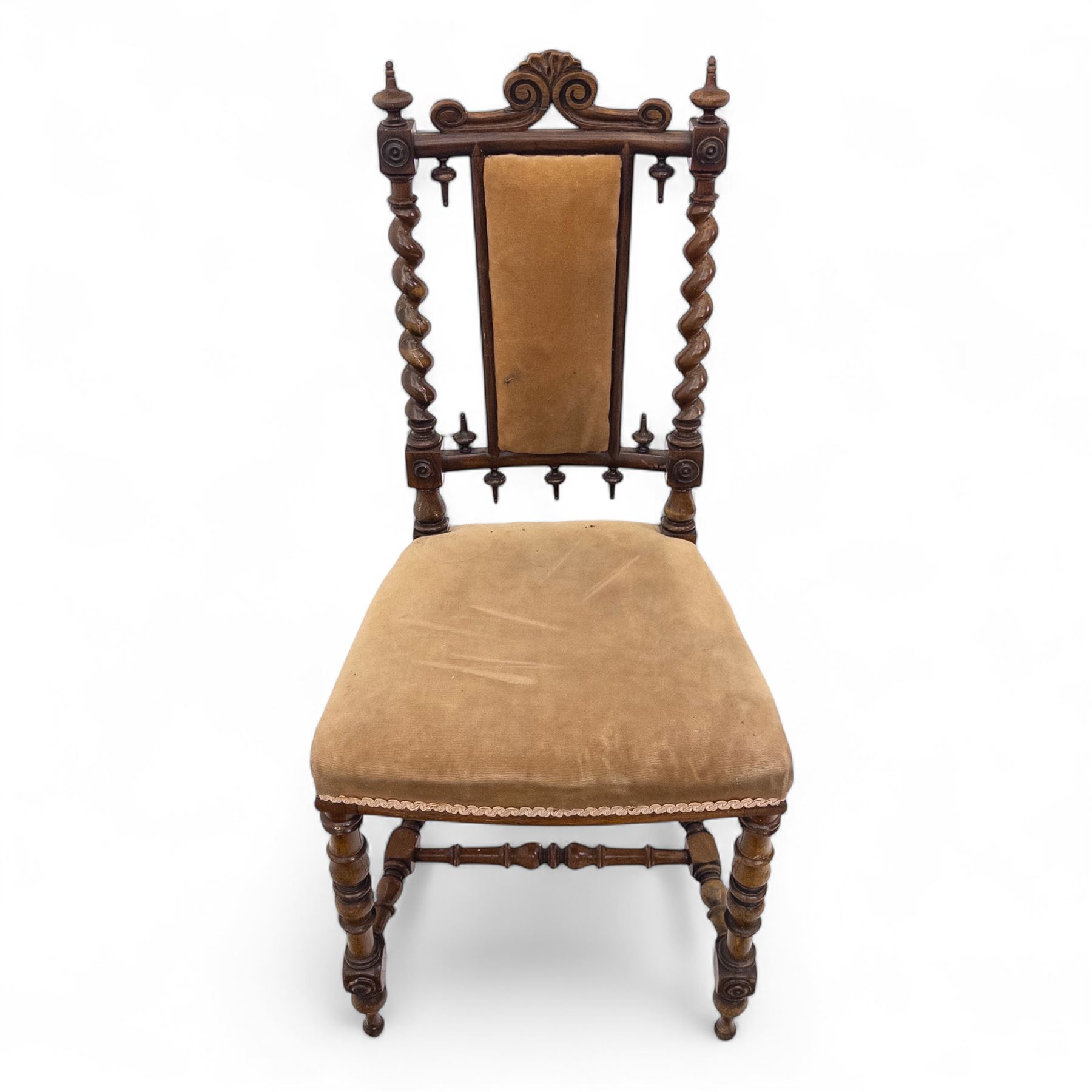 Pair of 19th century oak hall chairs, shield form backs with carved scroll cresting and finial uprights, upholstered in tan velvet, on turned and block supports joined by stretcher rails