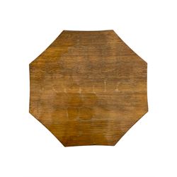 'Mouseman' oak occasional table, adzed octagonal top on cruciform base carved with mouse signature, on sledge feet, by Robert Thompson of Kilburn