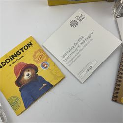 Four The Royal Mint United Kingdom 'Paddington' silver proof fifty pence coins, comprising '2018 'At the Station', 2018 'At the Palace', 2019 'At St Paul's' and 2019 'At the Tower', all cased with certificates 