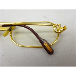  Cartier: Must Santos 18k gold plated glasses, size 55-20, with certificate and guarantee in red leather case with outer case    