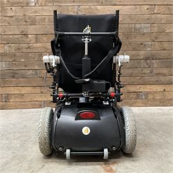 Permobil LSA Lifestand seated and standing wheelchair