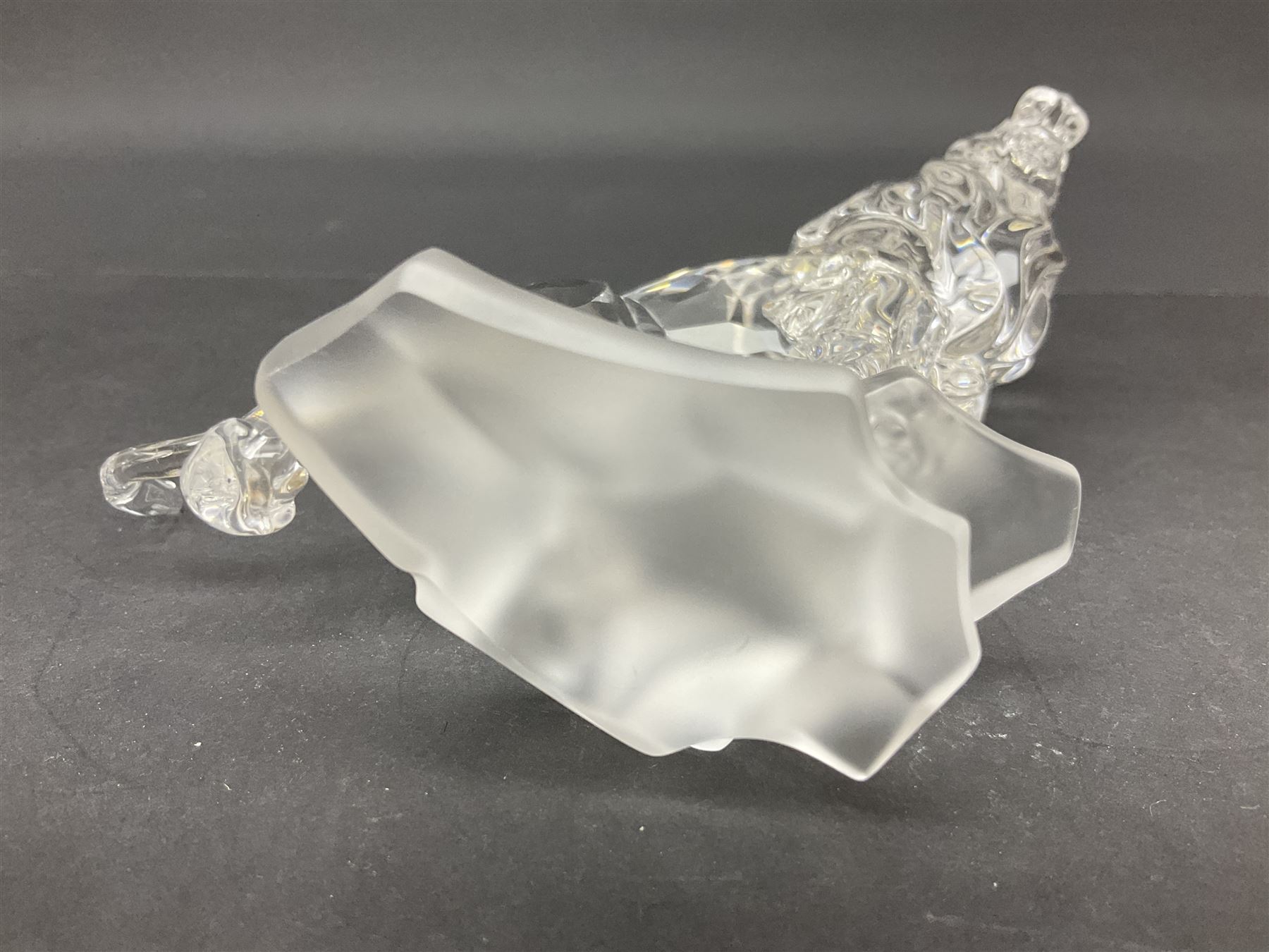 Swarovski Crystal animals, comprising camel and lion, both upon frosted crystal bases, together with Swarovski Crystal palm tree, upon similar frosted crystal base, tallest H14cm