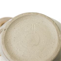 John Egerton (c1945-2024): studio pottery teapot, decorated with foliage and flowers on a cream ground, with impressed ammonites to the handle and spout, marked beneath, H28cm