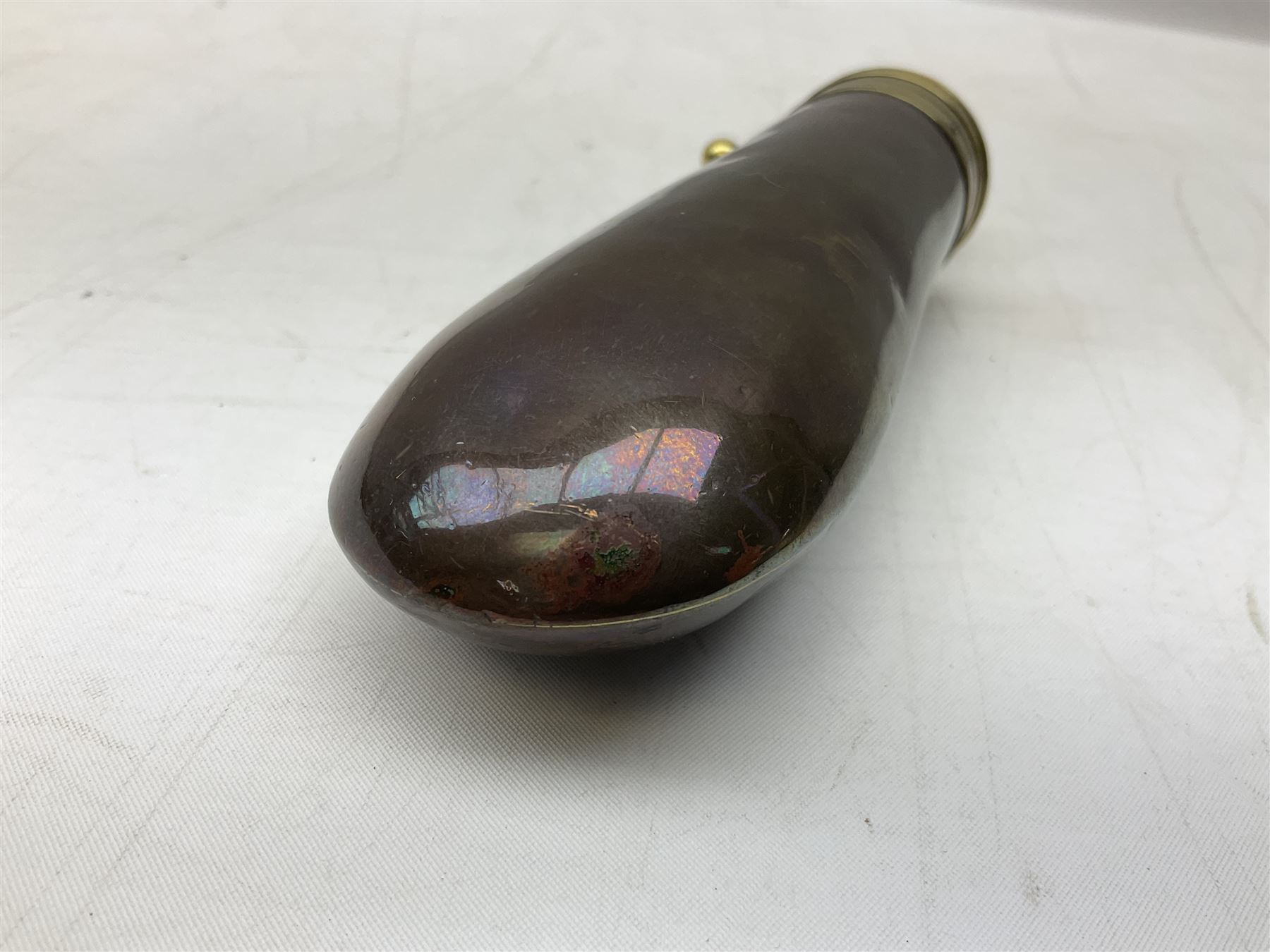 Two Sykes Patent brass mounted small load powder flasks with fire proof safety tops - one with slim plain copper body H17.5cm; the other with plain gun metal body H19cm (2)