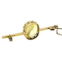 Natural cushion cut yellow sapphire gold bar brooch, stamped 9ct, the sapphire of approx 16mm x 13.35mm x 9.82mm
