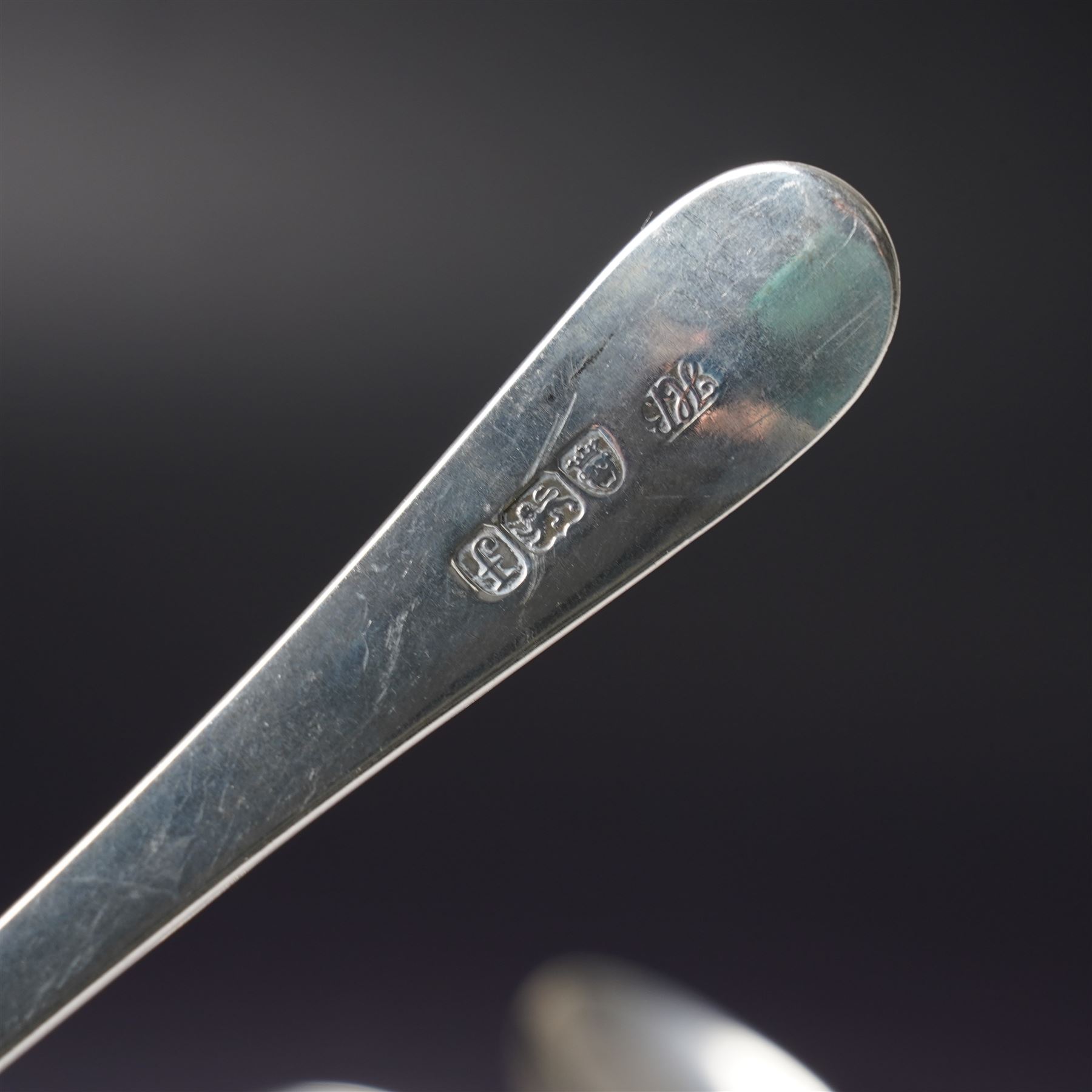 George III silver bright cut table spoon London 1781 Maker Hester Bateman, another London 1782 Maker Thomas Wallis I and three others (5)