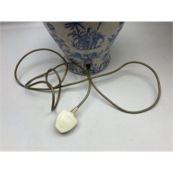Modern pierced oriental white ceramic vase shaped table lamp, together with a blue and white baluster shaped example decorated with figures upon elephants, both with shades, tallest H83cm incl shade