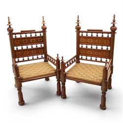 Pair of Anglo-Indian brass inlaid hardwood low chairs, the backs with turned spindle rails...