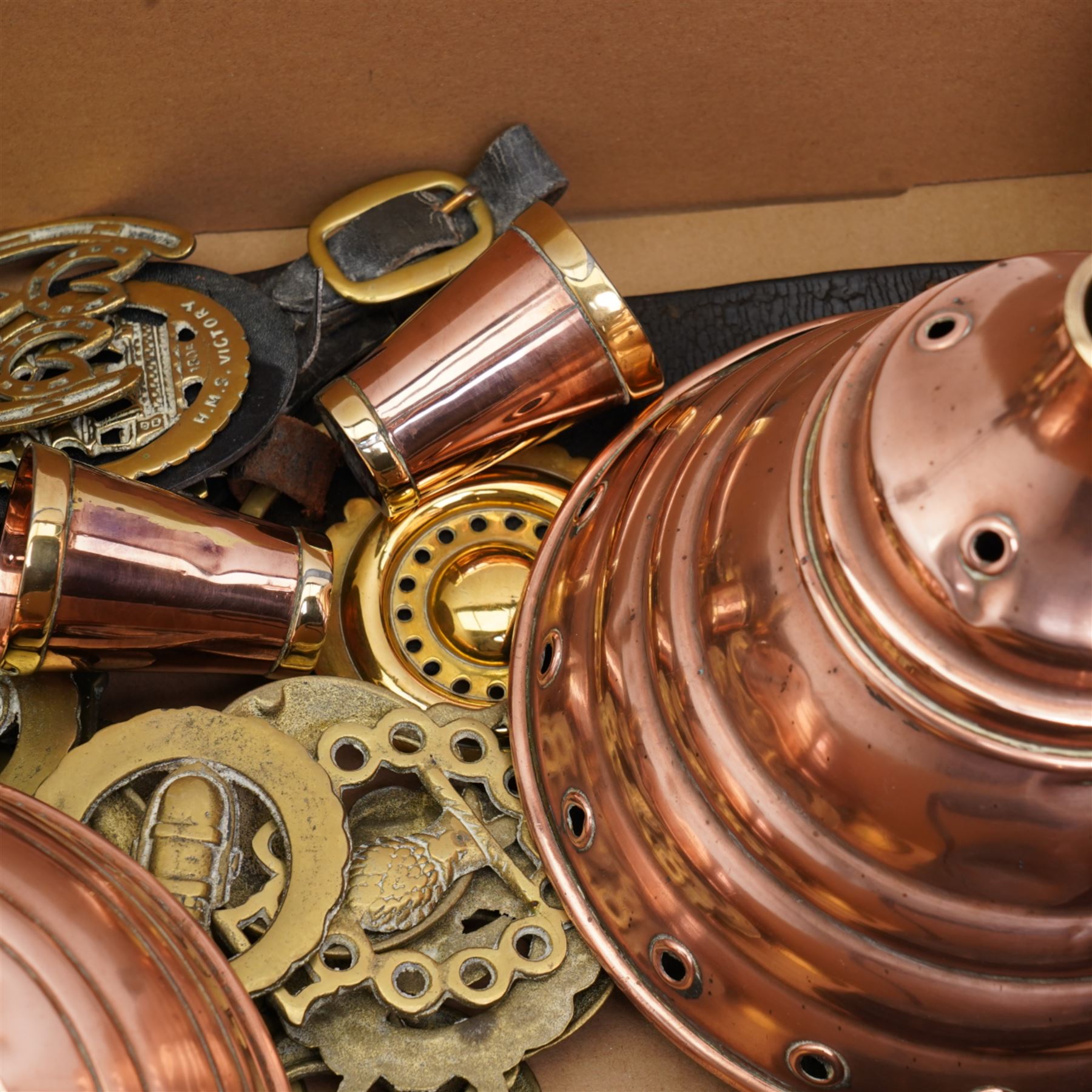 Collection of loose horse brasses, Wafax copper bed warmer, pair of brass shell cases, copper posser, warming pan on turned wooden handle etc