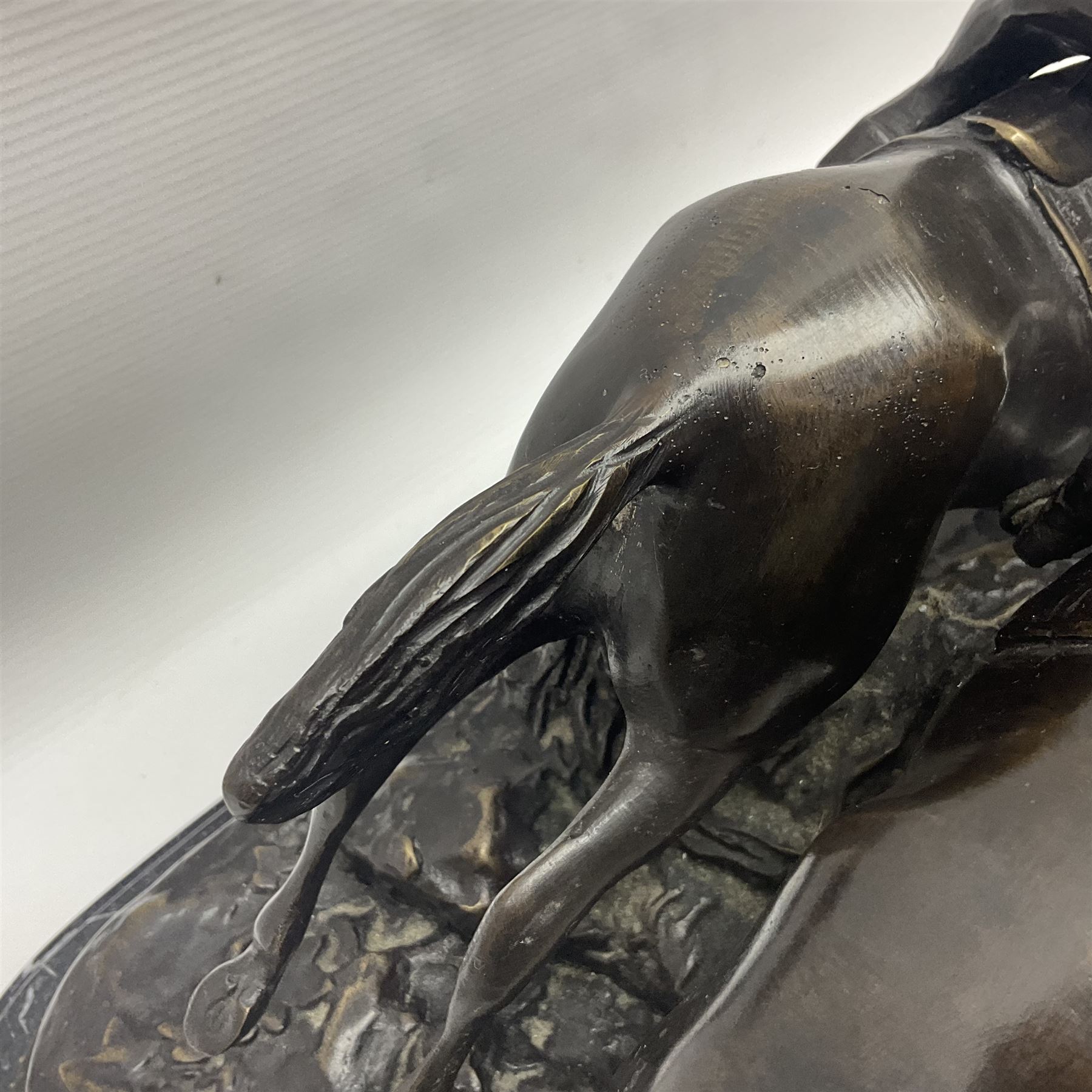 After E Loiscay, bronzed figure group, modelled as two race horses, signed E Loiscay, upon a stepped marble plinth, overall H28cm