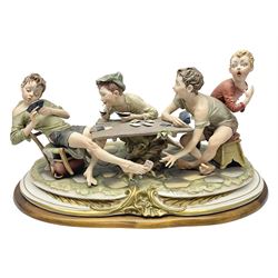 Capo Di Monte group The Cheats, modelled as boys playing cards, with certificate, H27cm 