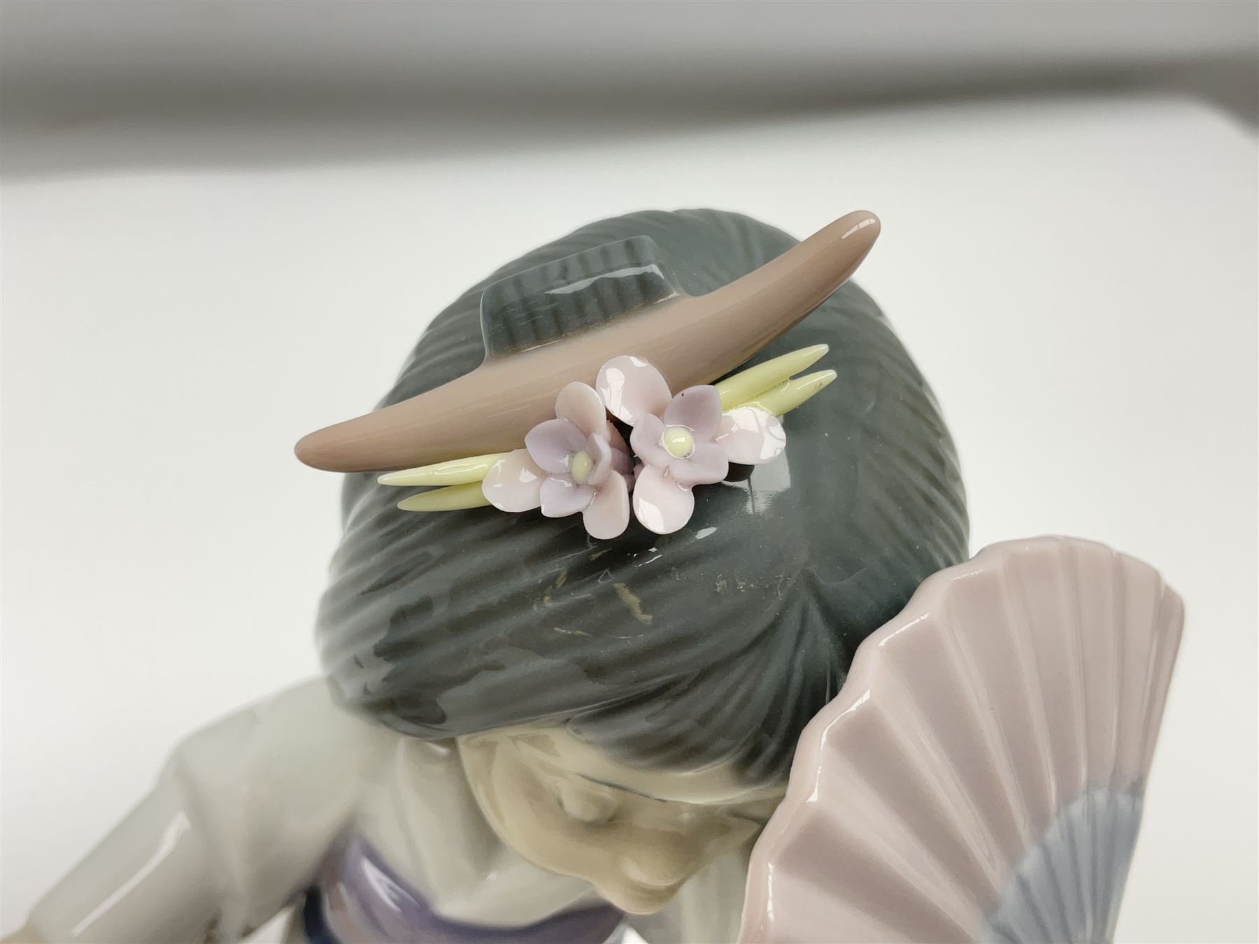 Six Lladro figures of the China doll set and Oriental doll set, comprising Playing the Flute no.6150, Bearing Flowers no.6151, Flower Gazer no. 6152, Oriental Dance no. 6230, Oriental Lantern no. 6231 and Oriental Beauty no. 6232, largest H20cm