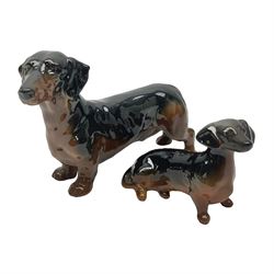 Beswick dachshund, model no 1460, together with Royal Doulton dachshund figure 