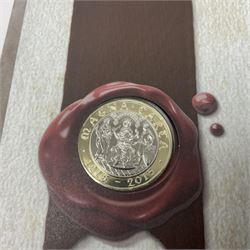Mostly commemorative coinage, including various Queen Elizabeth II United Kingdom brilliant uncirculated fifty pence, two pound and five pound coins in card folders, The Royal Mint United Kingdom 2012 proof coin set, Alderney 2021 'Royal National Lifeboat Institution' five pound coin cover in Harrington and Byrne folder etc
