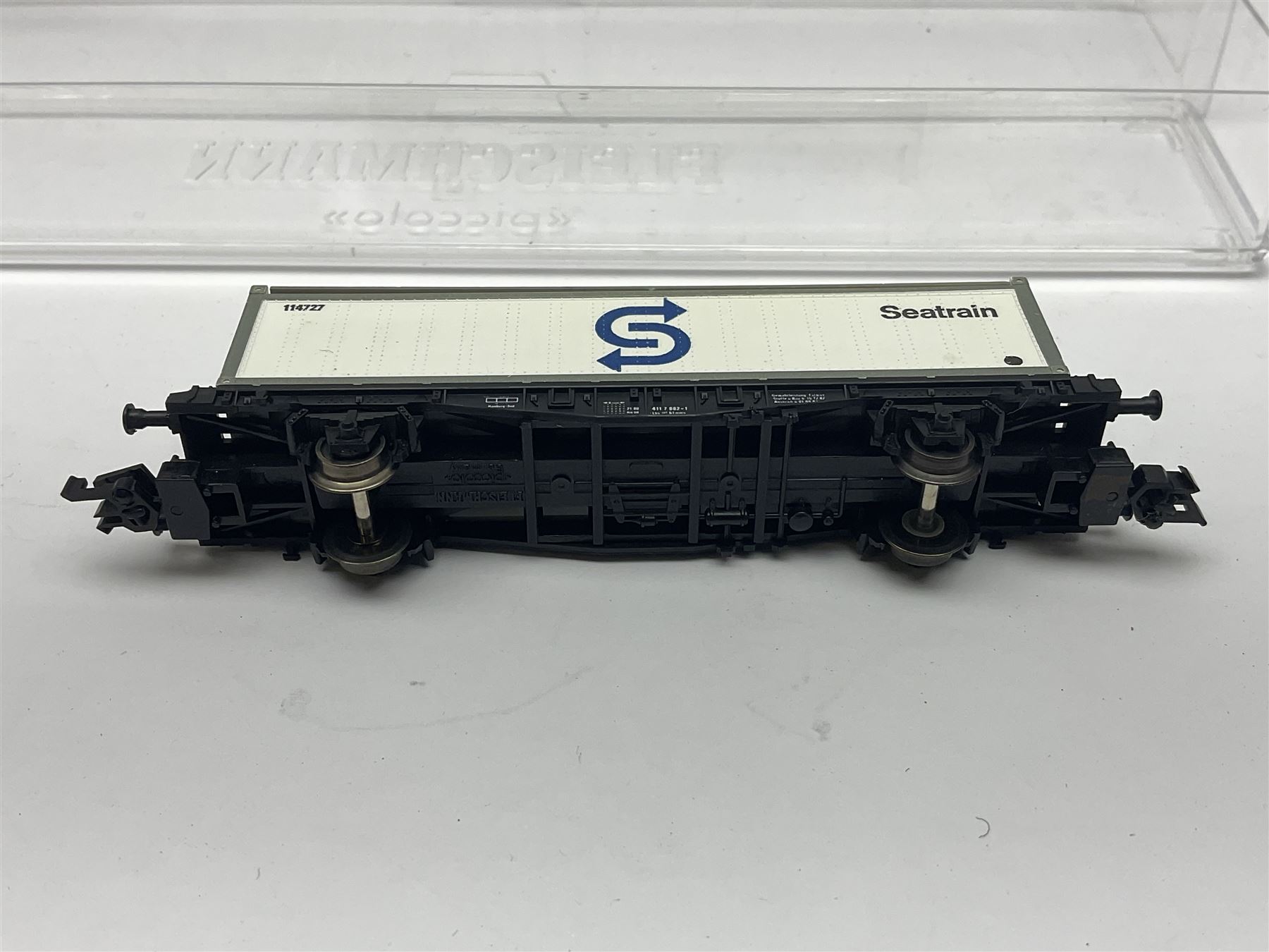Fleischmann ‘N’ gauge ‘Piccolo’ - sixteen carriages, wagons and cars comprising nos. 8051, 8052, 8055, 8064, 8119K, 8127, 8128, 8129, 8202, 8211, 8224, 8240, 8281, 8301, 8500, 9372; along with Minitrix N503 Shock Van and 13576 6 ton Mineral Wagon; boxed and loose (18) 