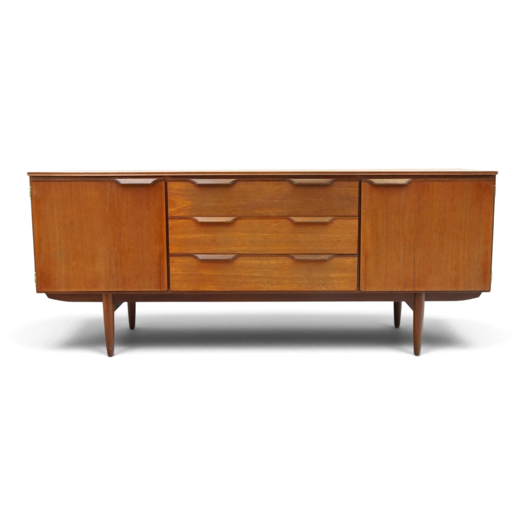 Frank Guille for Austinsuite - mid-20th century teak sideboard, fitted with three central graduating drawers flanked by cupboards, on tapering supports