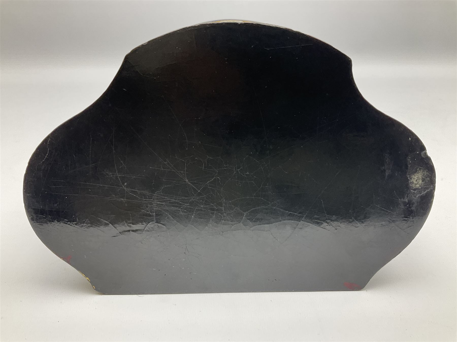 Victorian papier-mâché stationary box, of rounded wedge form with mother of pearl escutcheon, the hinged and curved cover and sides hand painted with floral sprays, opening to reveal a lined and fitted interior, H15cm L22cm D16cm