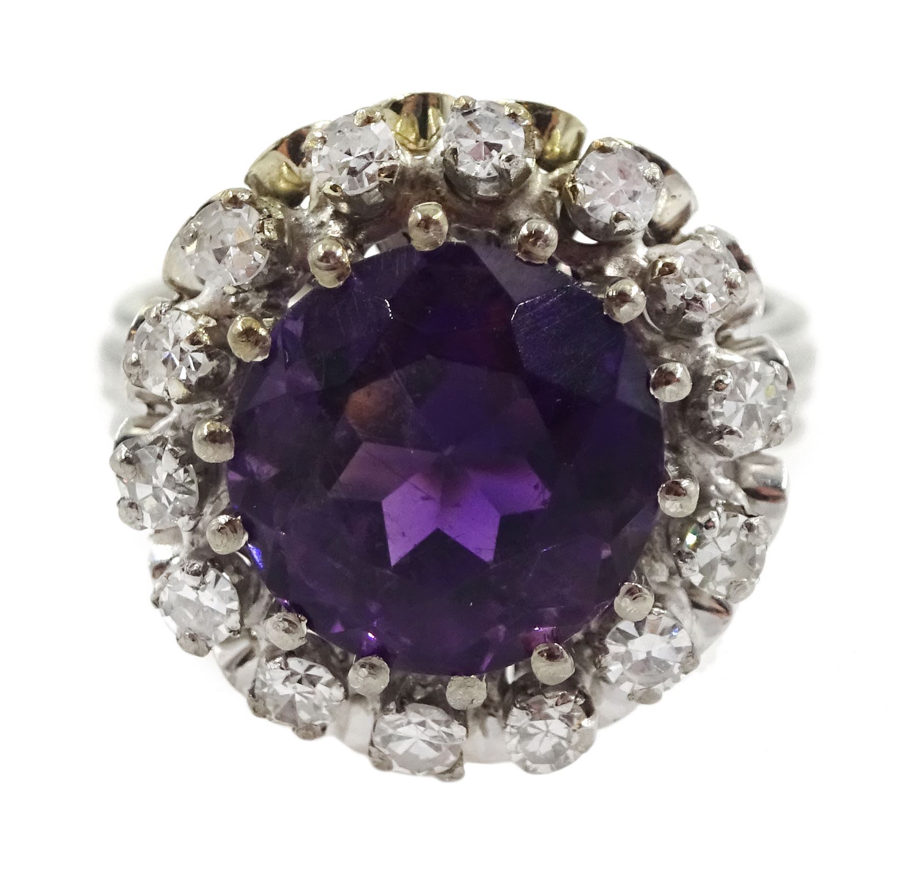 18ct gold circular purple stone ring