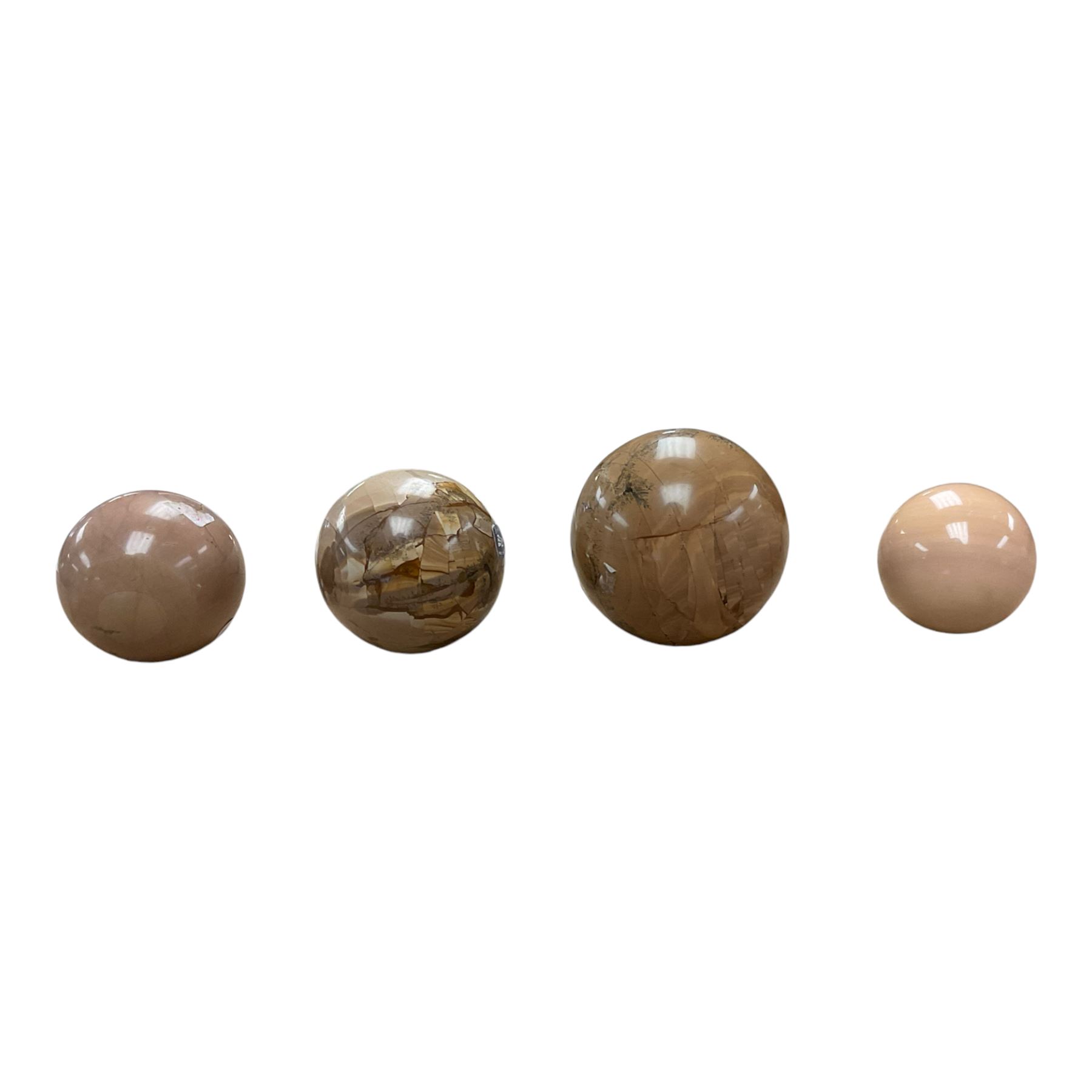 Collection of four stone spheres including Jasper examples 