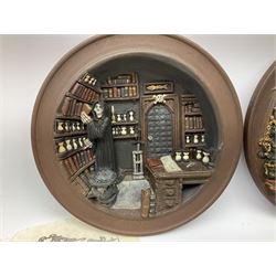 Two Terry Pratchett Discworld limited edition sculptured bas-reliefs, designed by Clarecraft, comprising Death Study created by 'the cunning artificer, Bernard the stout', 132/500 and The Hogfather, created by 'the cunning artificer, Bernard the stout', 132/500, both with certificates of authenticity.   