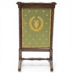 Victorian mahogany firescreen, the rectangular upholstered panel decorated with a Greek ur...