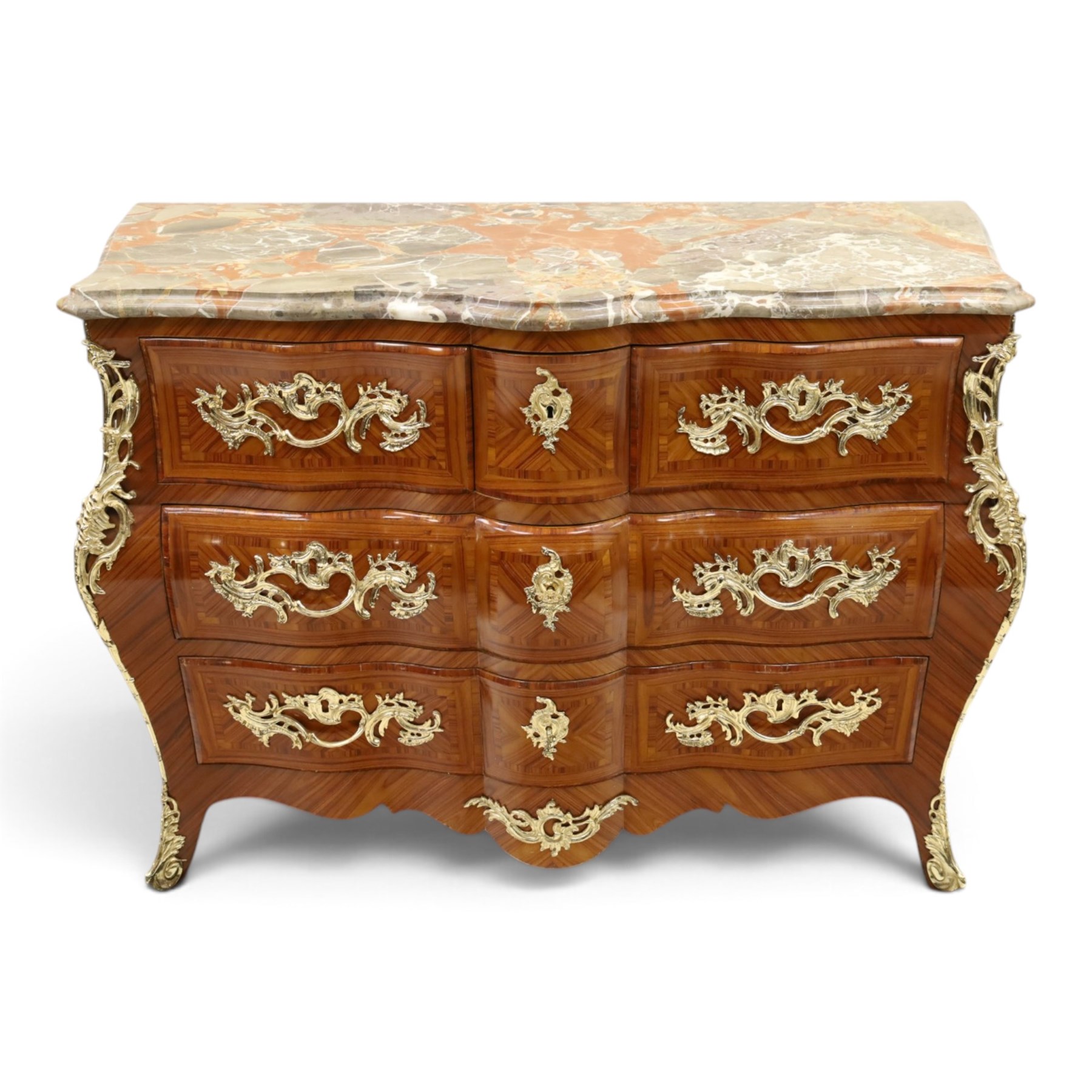 Colombo Mobili - Italian Louis XV design kingwood and marquetry bombé commode chest, the shaped marble top with moulded edge, fitted with an assortment of three shaped short drawers over two long, each with parquetry veneered facias and rocaille shaped gilt metal handles and escutcheons, flanked by gilt metal cartouche mounts with scroll and foliate detail, shaped apron on splayed bracket feet