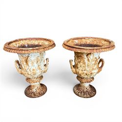 Andrew Handyside - pair of 19th century best quality cast iron garden urns, individually detailed in relief Allegorical Figures and Helaldic Swans, campagna form with twin handles, detail under rim, raised on circular fluted base