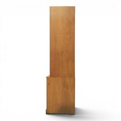 Mouseman - oak floor standing corner cabinet, scalloped cornice above a leaded glass cabinet, blackened metal hinges and latches, with carved mouse by the workshop of Robert Thompson of Kilburn