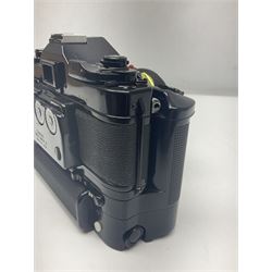 Canon A-1 camera body, serial no. 341014, with 'Canon FD 50mm 1:1.4 S.S.C.' lens, serial no. 12077119 and motor drive MA