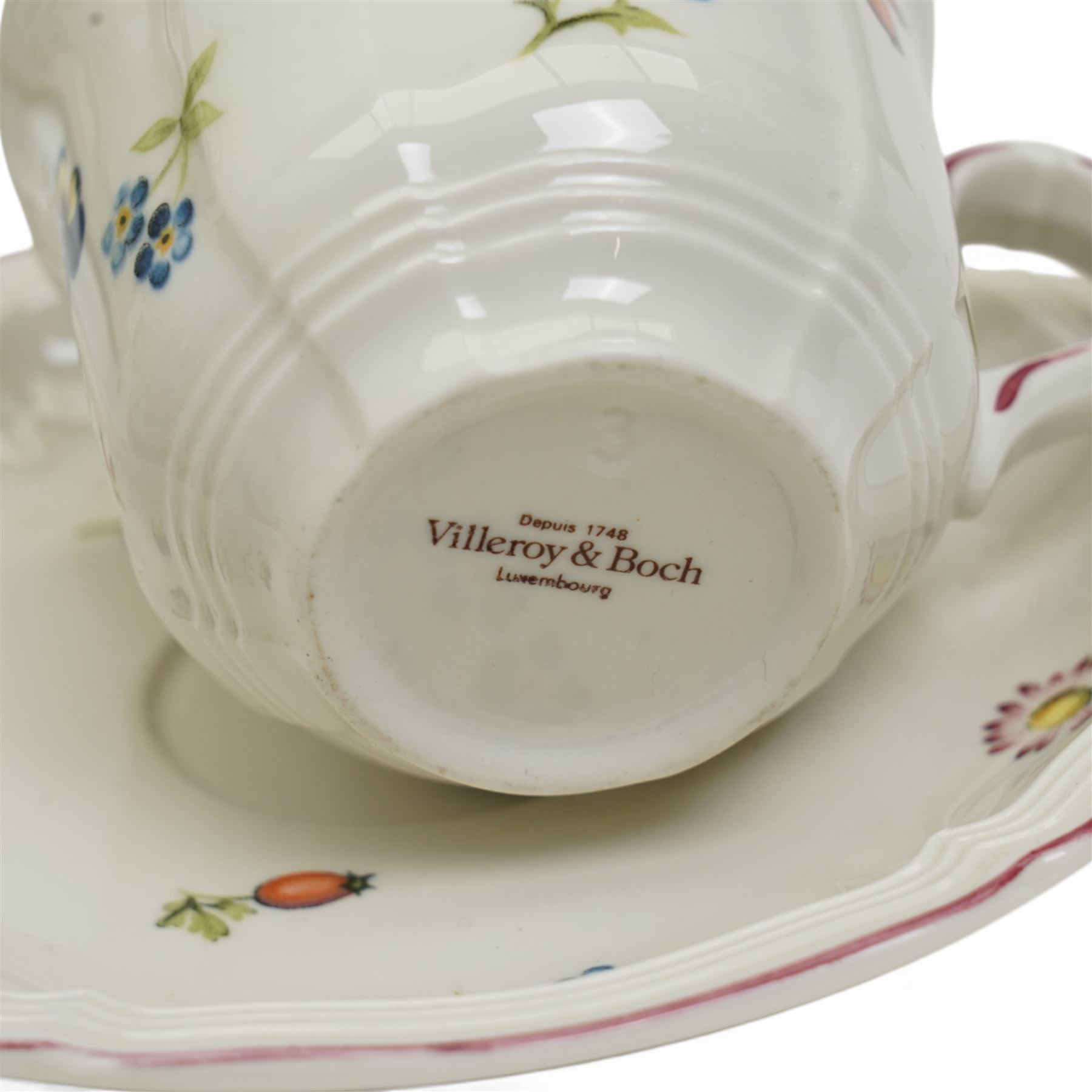 Villeroy & Boch Petite Fleur pattern part tea service comprising seven cups, ten saucers, ten plates, sugar bowl and cover, milk jug, saucer dish and rectangular plate