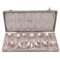 Set of twelve early 20th century Danish silver Cactus pattern demitasse spoons by Georg Jensen, marked for Georg Jensen, Denmark, also marked with Swedish national control mark and S standard mark for minimum 800 standard silver, contained within tooled leather David Andersen case with silk interior