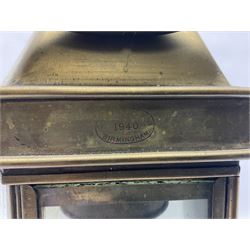 Large brass maritime lamp by Griffiths & Sons Birmingham with swing handle, threaded mounting bracket and associated oil burner, H41cm excluding handle