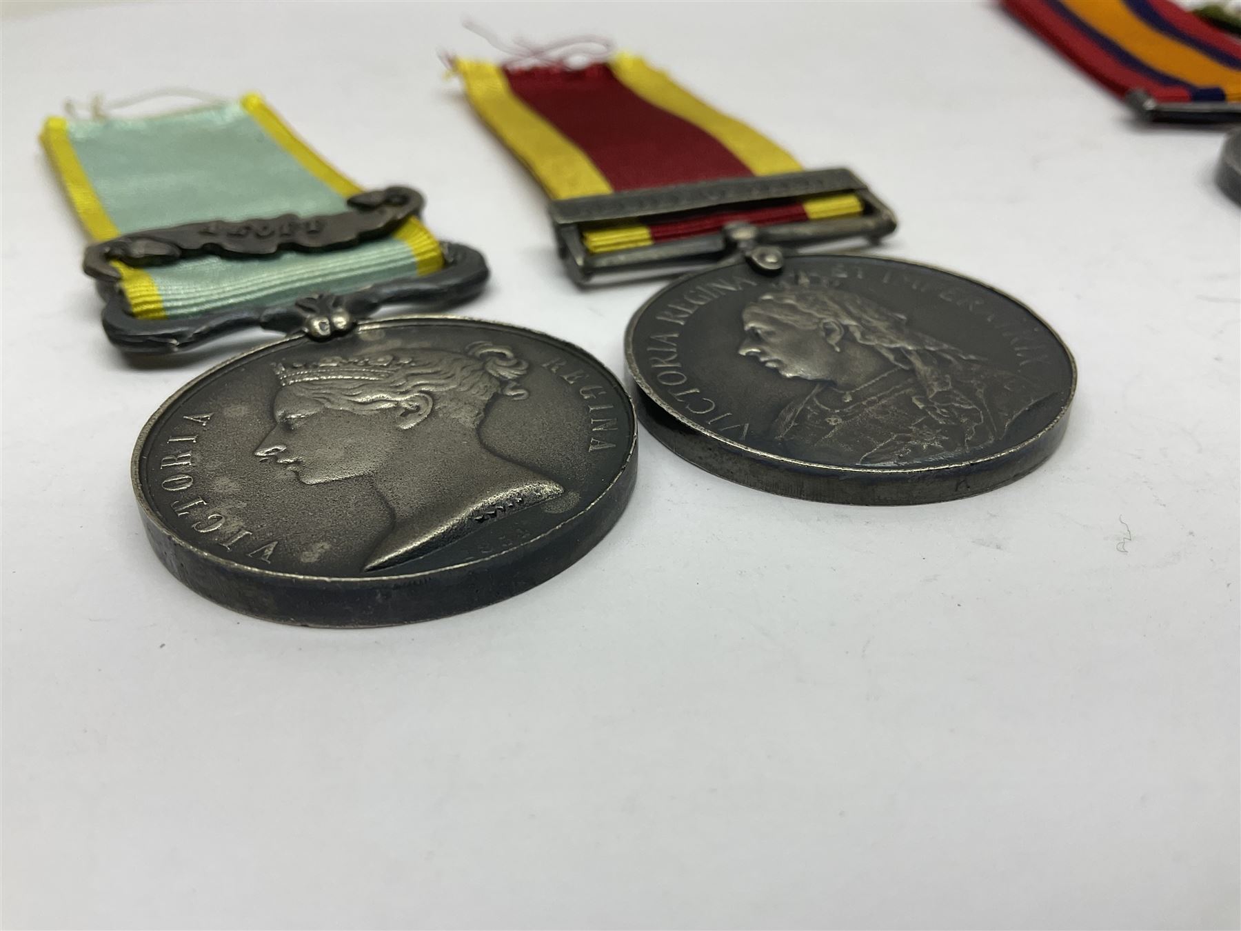 Seven copies of early medals - Waterloo, Crimea, Mediterranean, China 1900, Victoria Cross, Natal Rebellion and Tibet 1903-4; all with ribbons (7)