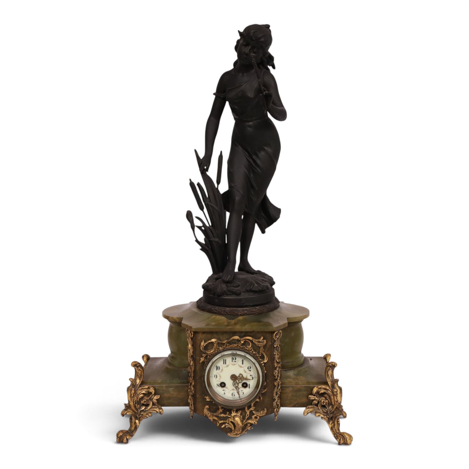 French green onyx clock, surmounted by a female figure amongst rushes, the enamel clock face with floral sprigs, H74cm 
