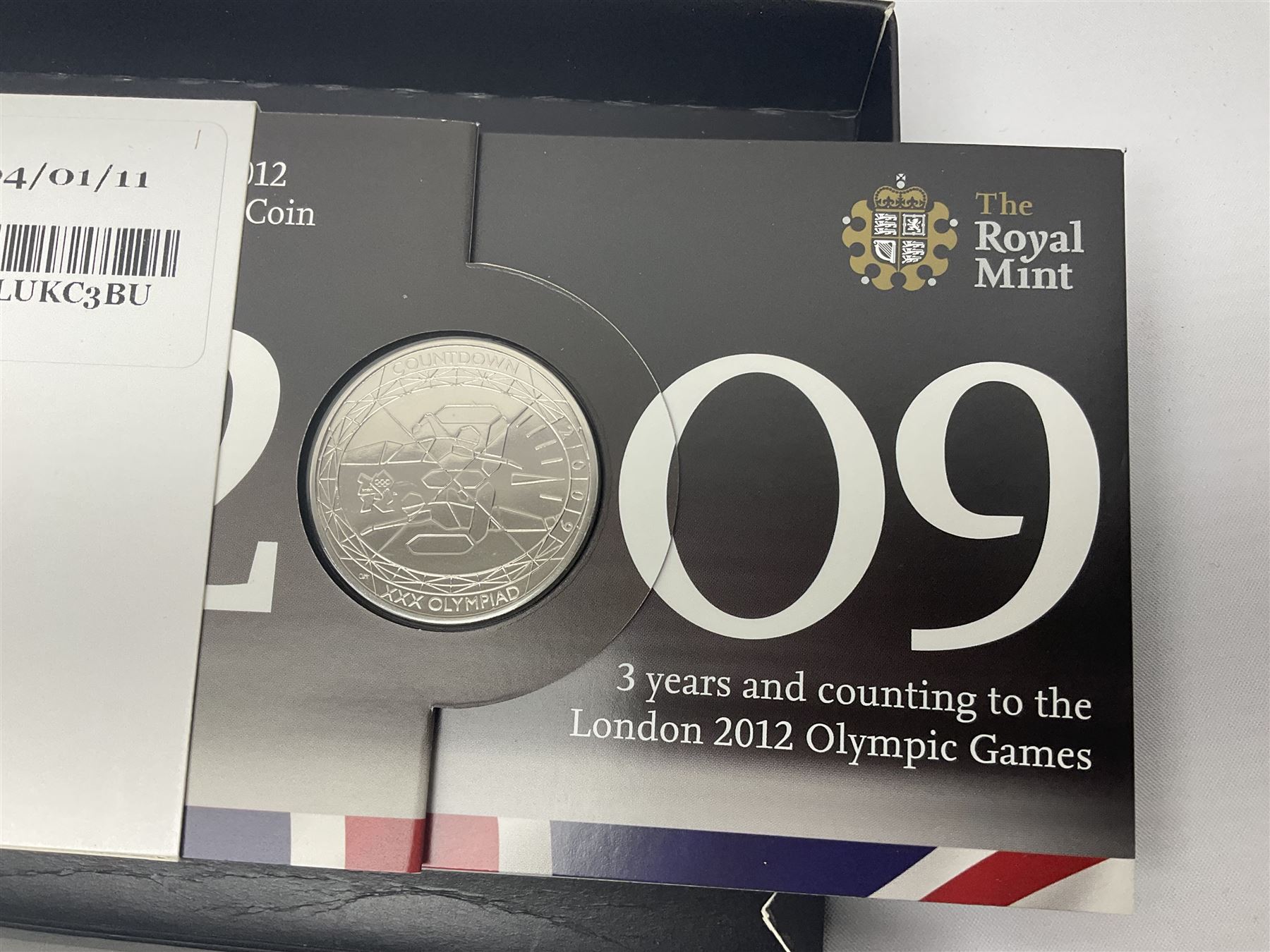 Mostly commemorative coinage, including various Queen Elizabeth II United Kingdom brilliant uncirculated fifty pence, two pound and five pound coins in card folders, The Royal Mint United Kingdom 2012 proof coin set, Alderney 2021 'Royal National Lifeboat Institution' five pound coin cover in Harrington and Byrne folder etc