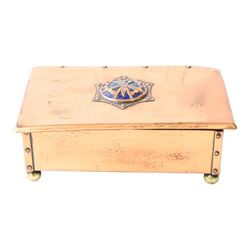  Arts & Crafts copper and enamel box, of rectangular form, the hinged lid with central enamel cabochon overlaid with pierced copper butterfly motif, raised on brass bun feet, H7cm, L17cm