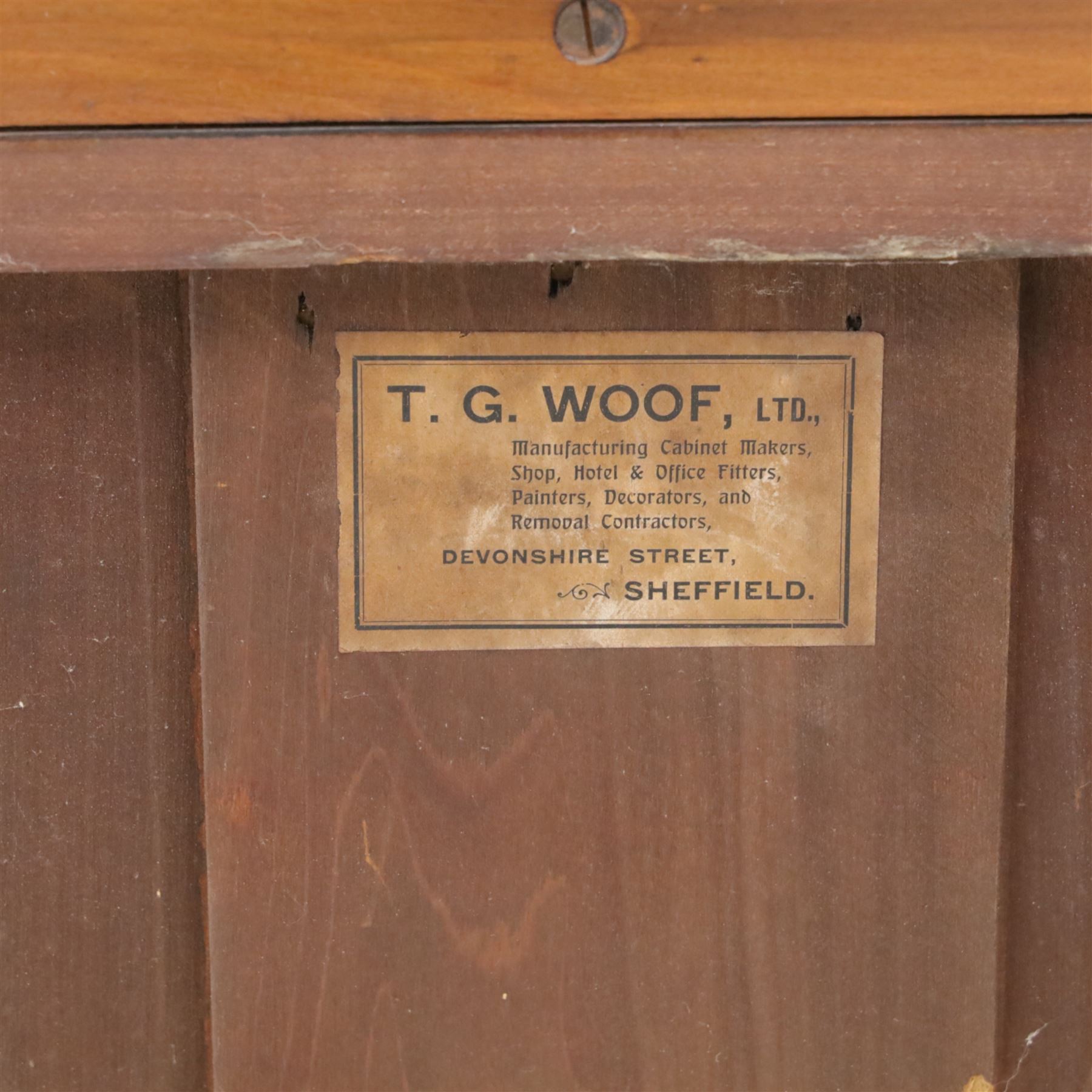 Edwardian walnut dressing chest, rectangular top surmounted by a mirror frame with shaped pediment on swing supports above two short frieze drawers over two short and three long graduated drawers fitted with brass foliate handles, raised on a plinth base