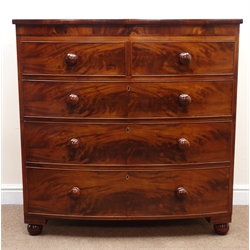  Victorian bow front mahogany chest, two short and three long cockbeaded drawers with turned wooden handles on turned feet, W109cm, H110cm, D55cm  