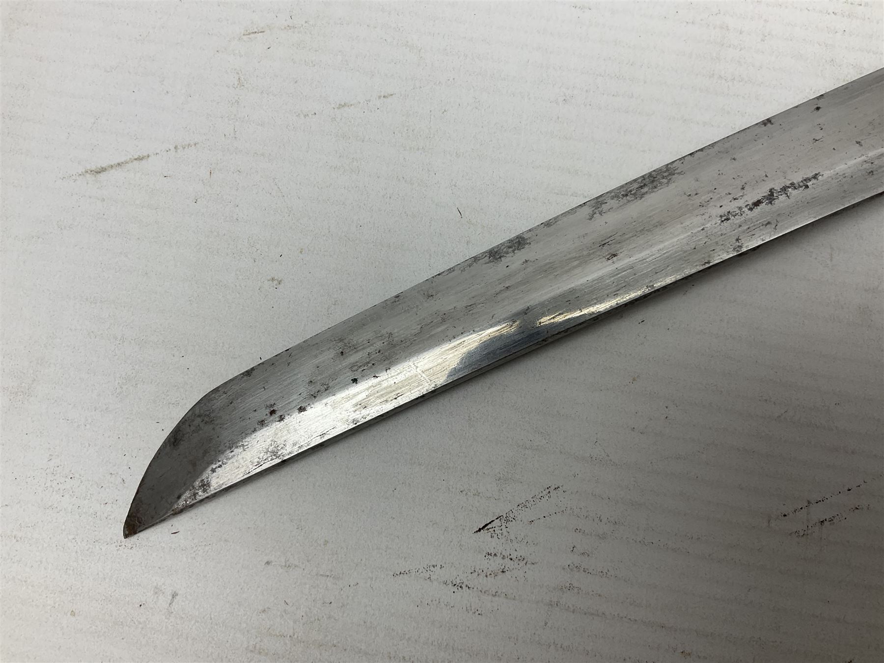 Good quality Japanese sword blade with later WWII fittings and scabbard  - 67.5cm slightly curving blade with unmarked tang, plain iron tsuba and lacquered grip with copper mounts; in lacquered wooden scabbard with tape bound tip L94cm overall