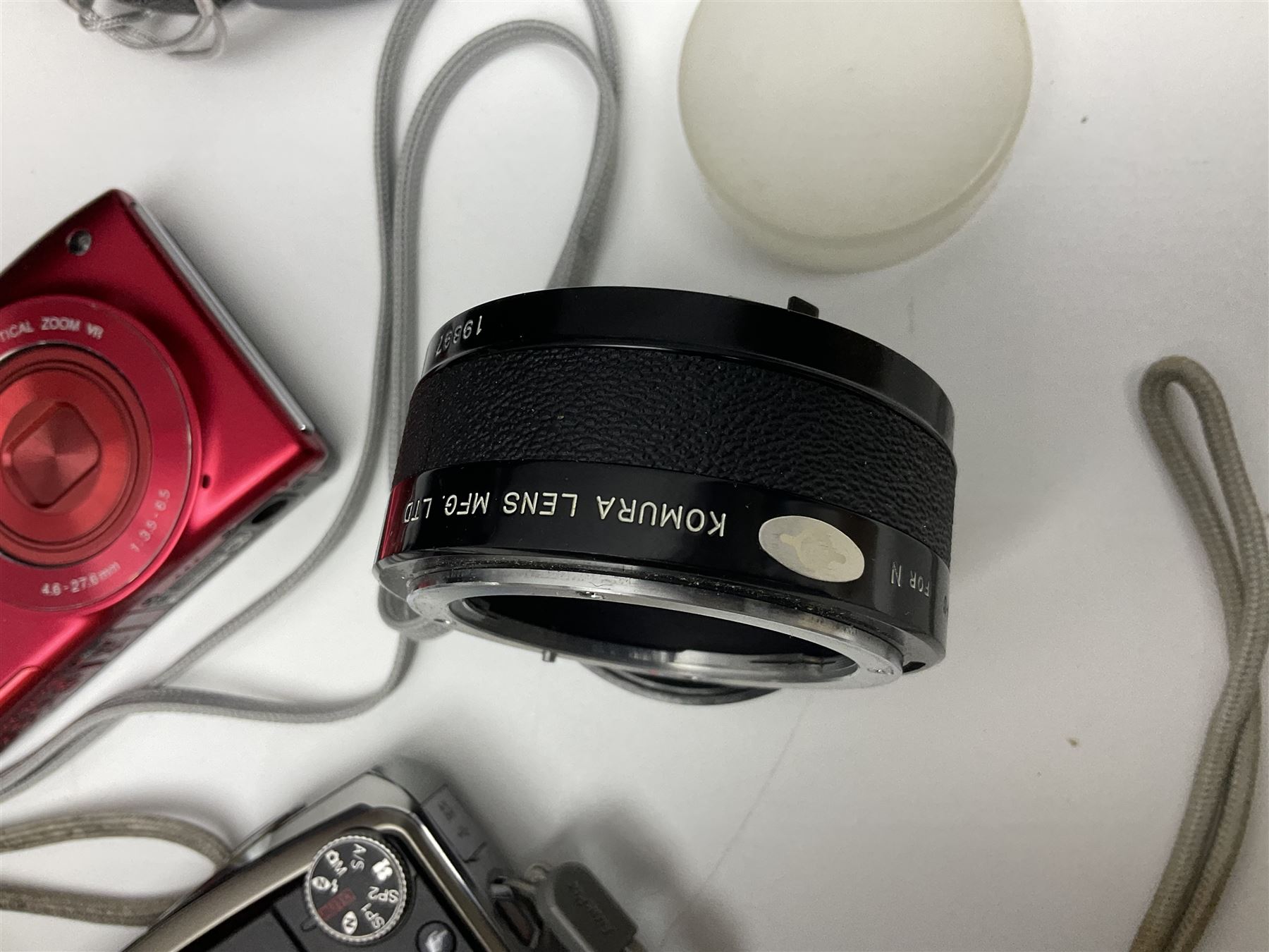 Nikon Coolpix 8700 camera body, serial no 3220838, with Zoom Nikkor Ed 8.9-71.2mm 1:2.8-4.2 lens, together with Canon digital video camcorder and other digital cameras and camera equipment