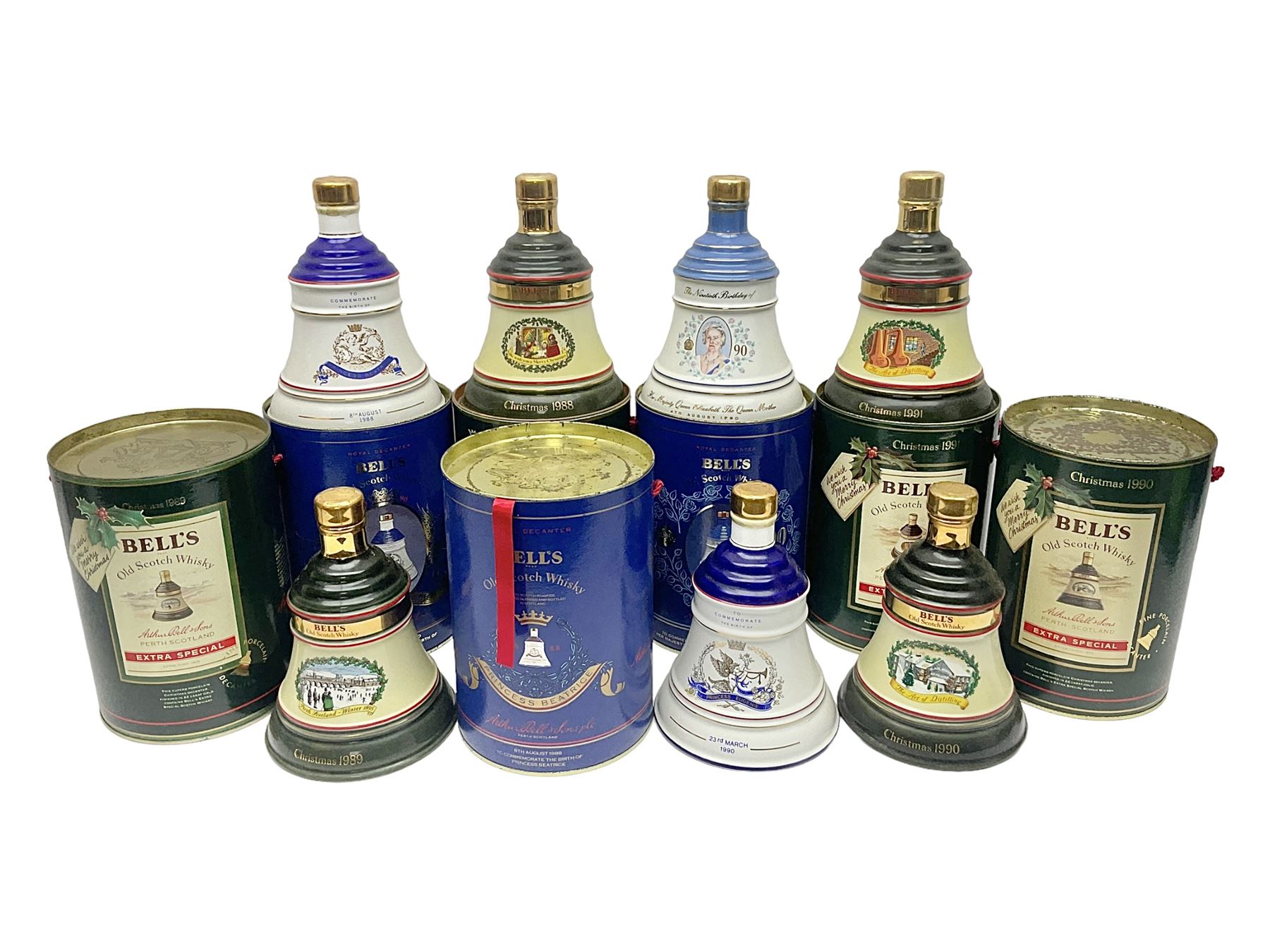 Bells, Scotch whisky, in seven Wade ceramic decanters, including Christmas 1988, 1989, 1990, 1991 etc