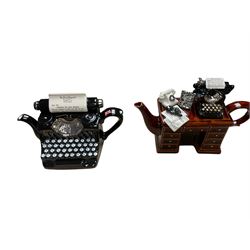 Collection of novelty teapots, together with two honey pots 