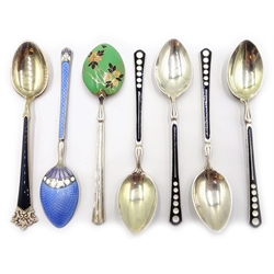  Six silver and enamel coffee spoons by Turner & Simpson, Birmingham 1938/48 and Robert Chandler, Birmingham 1922 and one other stamped Sterling (7)  