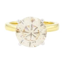 18ct gold diamond single stone ring, four claw set with a light brown diamond of approx 4....
