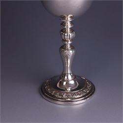 Late 20th century limited edition silver goblet, produced by Garrard & Co Ltd  to commemorate the silver wedding anniversary of Her Majesty Queen Elizabeth II and His Royal Highness the Duke of Edinburgh, the bowl engraved with Royal cyphers and anniversary dates, upon a knopped stem and embossed foot, no. 77/2000, hallmarked Garrard & Co Ltd, London 1972, H15cm