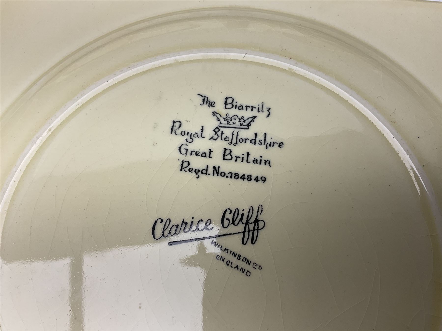 Clarice Cliff Biarritz part dinner set, circa 1930, for Royal Staffordshire, of rectangular form, decorated with bluebells, to include one serving plate, six dinner plates, three side plates, etc, printed mark beneath with reg no 784849 (17)