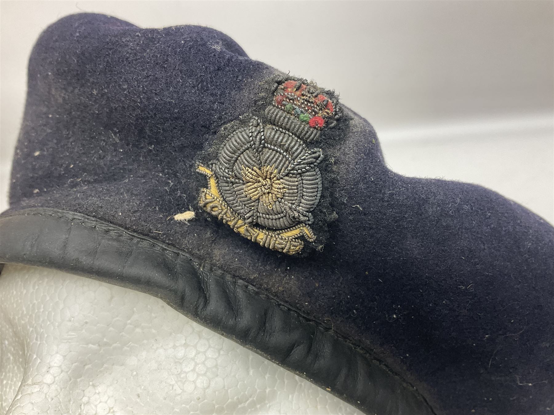 Collection of nineteen British Army booklets 1940s - 1970s including Small Arms Training 1944, various Infantry Training, Cadet Training Manual 1978, Signal Training, Commander's Aide Memoires etc; 1950s blue beret with Yorks Brigade badge; part travelling toilet set in cloth roll; all contained in pine box with webbing straps