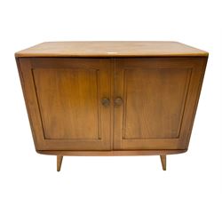 Ercol elm side cupboard, enclosed by two panelled doors