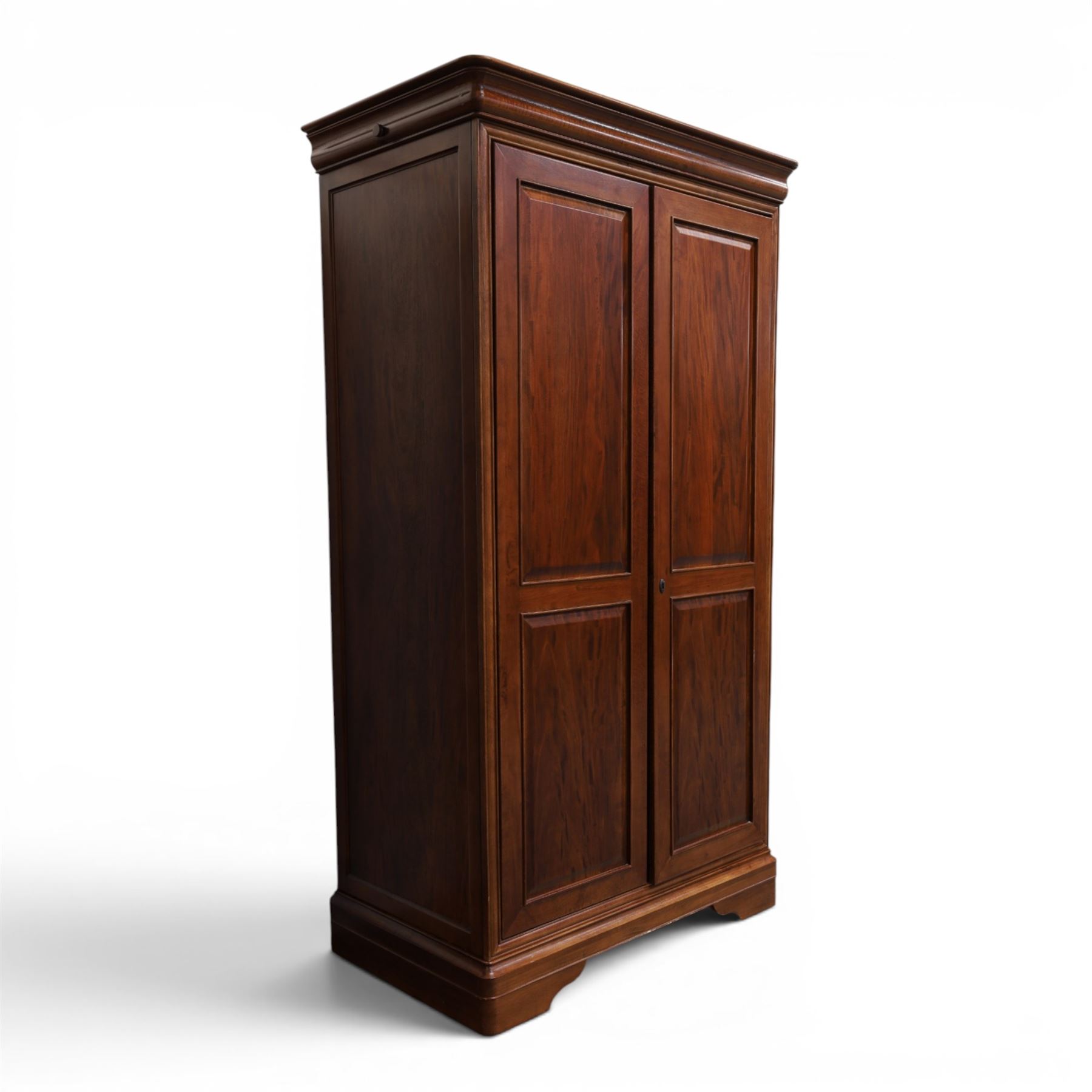 Willis & Gambier - mahogany bedroom wardrobe, projecting cornice with two additional rails, panelled doors with trouser rack and blue baize trinket, enclosing a shelf above a wooden clothes rail and shoe rack, raised on bracket feet 